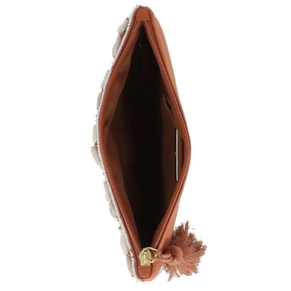 Photo 5 of International Concepts Kimmy Women's Shell Pouch. Kimmyy Women's Shell Pouch • Body- canvas, lining- twill • Small sized bag- 8"W x 1/4"H x 6"D, weight- 0.12 lbs. • Magnetic snap closure • Gold- tone exterior hardware- shell, beads, tassel • Polyester, IN