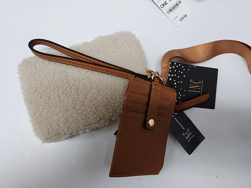 Photo 3 of Inc International Concepts Amandaa Wristlet and Card Case Lanyard Bone Brown. 6 3/4''W x 4 3/4''H x 1/4''D (width is measured across the bottom of handbag). 6"L wristlet strap. Zip closure. Gold-tone exterior hardware. 1 interior zipper pocket & coin pock