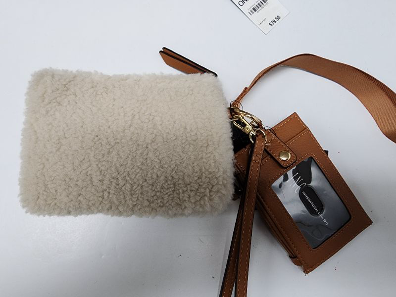 Photo 1 of Inc International Concepts Amandaa Wristlet and Card Case Lanyard Bone Brown. 6 3/4''W x 4 3/4''H x 1/4''D (width is measured across the bottom of handbag). 6"L wristlet strap. Zip closure. Gold-tone exterior hardware. 1 interior zipper pocket & coin pock