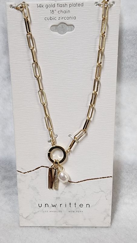 Photo 1 of UNWRITTEN Cubic Zirconia Initial & Freshwater Pearl 18" Pendant Necklace in Gold Plate
Freshwater pearl: 6mm
Set in fine silver plate or 14k gold flash-plated metal; cubic zirconia
Approx. length: 18"; approx. drop: 3/4"
Spring ring closure