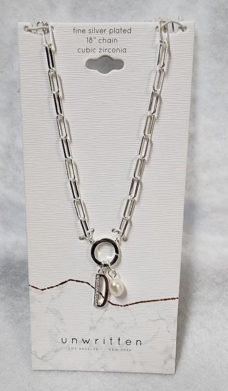 Photo 1 of UNWRITTEN Cubic Zirconia Initial & Freshwater Pearl 18" Pendant Necklace in Silver Plate
Freshwater pearl: 6mm
Set in fine silver plate or 14k gold flash-plated metal; cubic zirconia
Approx. length: 18"; approx. drop: 3/4"
Spring ring closure