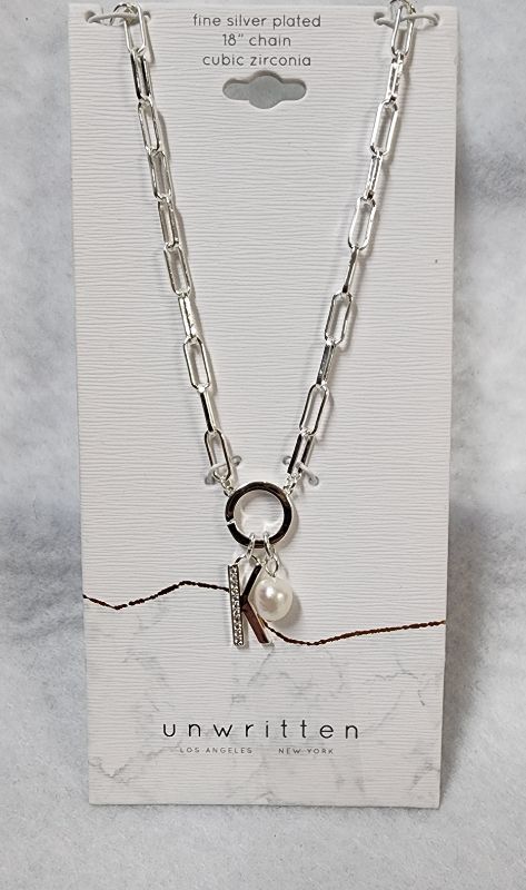 Photo 1 of UNWRITTEN Cubic Zirconia Initial & Freshwater Pearl 18" Pendant Necklace in Silver Plate
Freshwater pearl: 6mm
Set in fine silver plate or 14k gold flash-plated metal; cubic zirconia
Approx. length: 18"; approx. drop: 3/4"
Spring ring closure