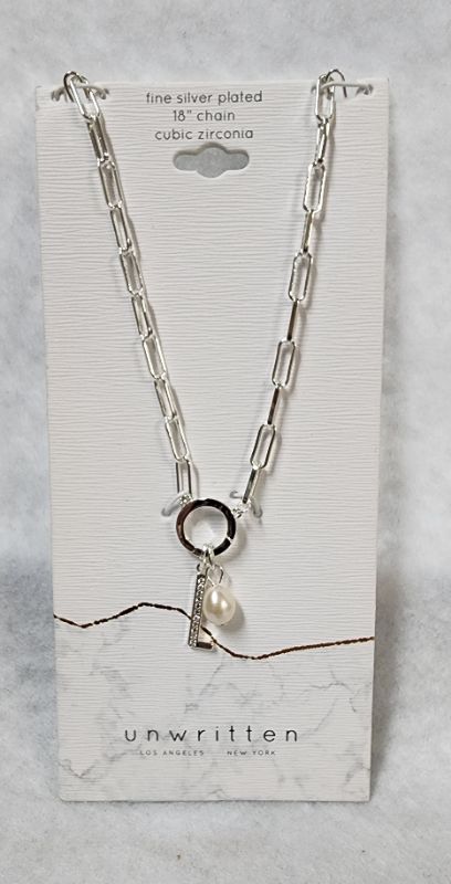 Photo 1 of UNWRITTEN Cubic Zirconia Initial & Freshwater Pearl 18" Pendant Necklace in SilverPlate
Freshwater pearl: 6mm
Set in fine silver plate or 14k gold flash-plated metal; cubic zirconia
Approx. length: 18"; approx. drop: 3/4"
Spring ring closure