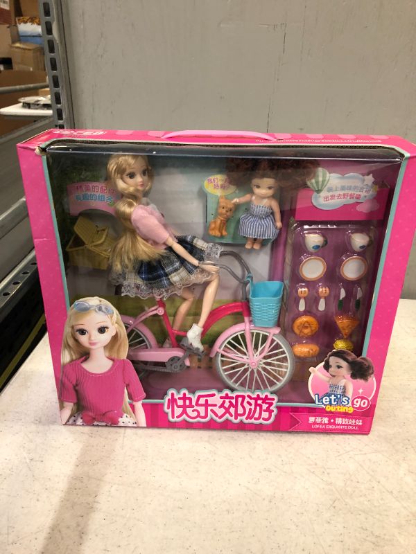Photo 1 of BARBIE DOLL WITH BICYCLE