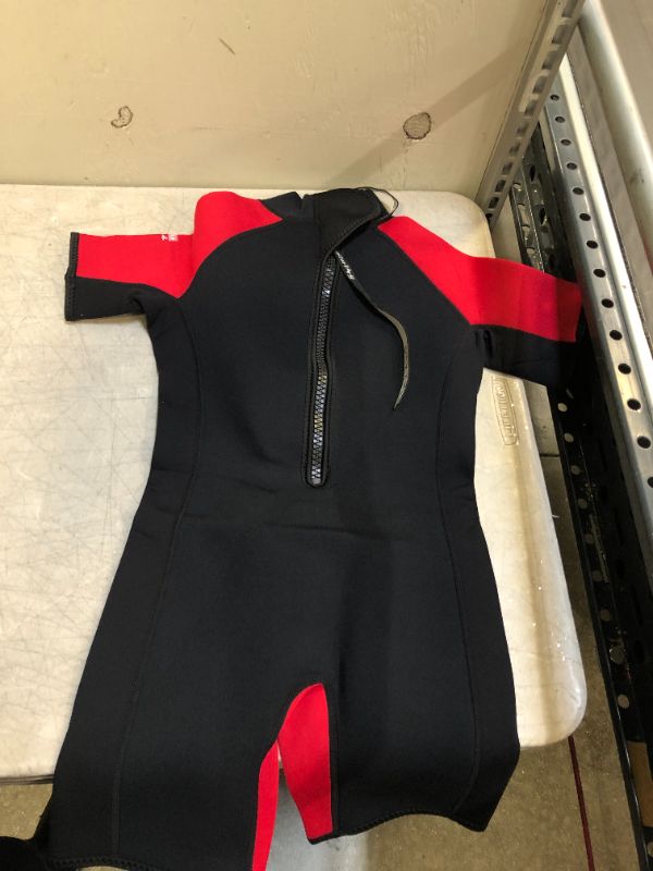 Photo 1 of kids wet suit size 10