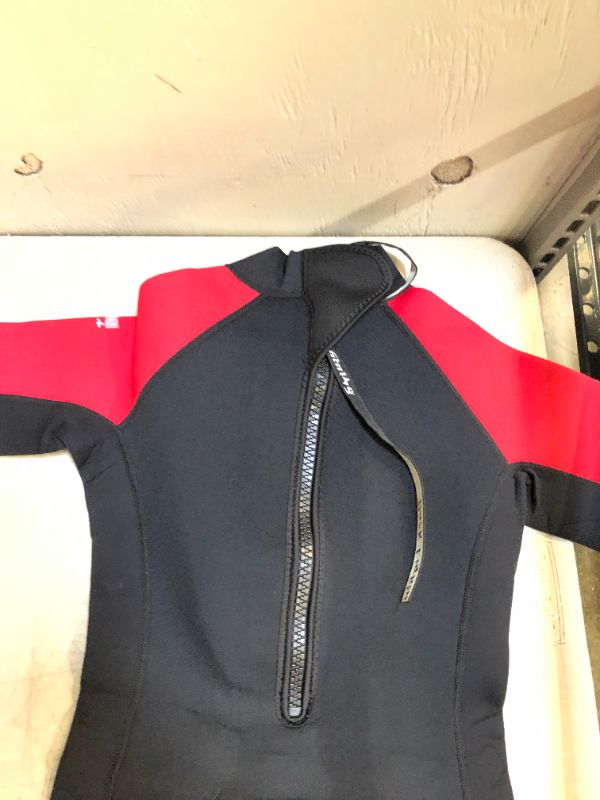 Photo 2 of kids wet suit size 10