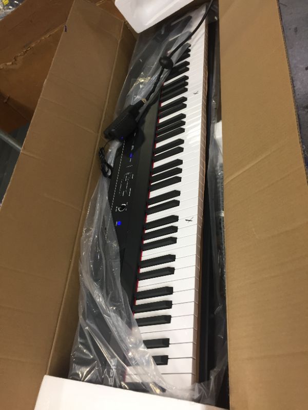 Photo 2 of Alesis, 88 Beginner Digital Piano/Keyboard with Full Size Semi Weighted Keys, Power Supply, Built in Speakers and 5 Premium Voices (Amazon Exclusive), (Recital)
