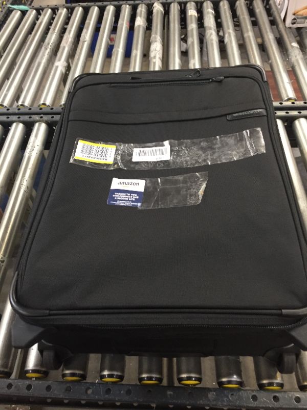 Photo 1 of Black luggage bag