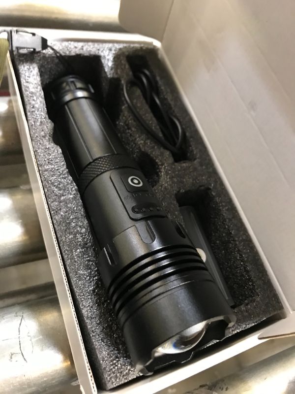 Photo 2 of BLACK TACTICAL FLASHLIGHT WITH MISC SETTINGS