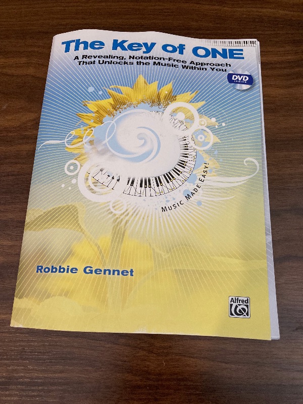 Photo 2 of The Key of One: A Revealing, Notation-Free Approach That Unlocks the Music Within You [With DVD]
by Robbie Gennet