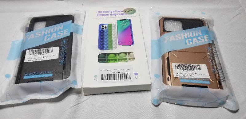Photo 1 of ASSORTED PHONE CASES