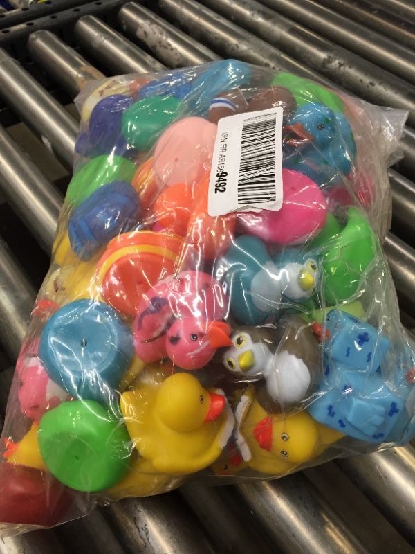 Photo 1 of bag of assorted rubber duckies