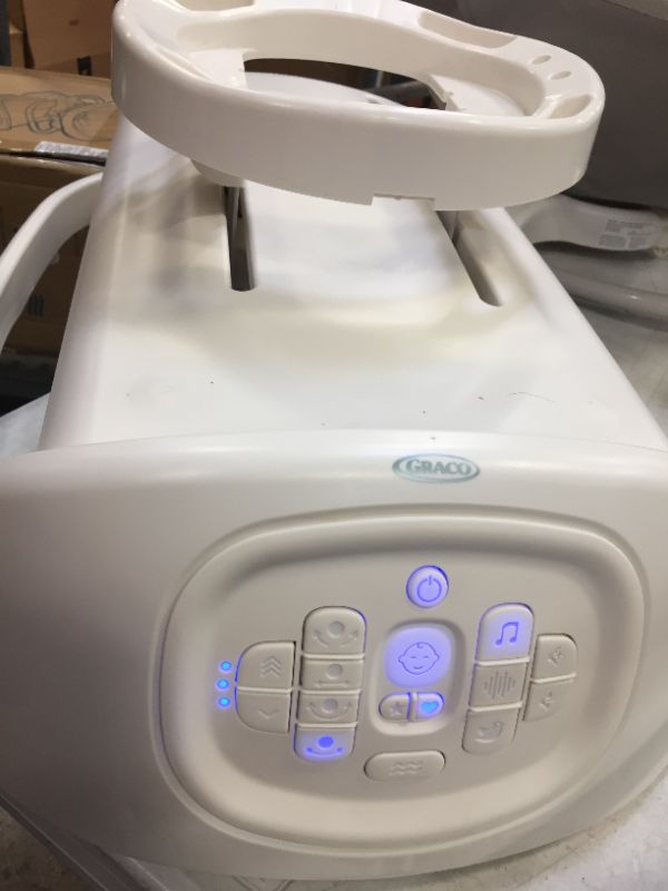 Photo 1 of Graco Sense2Soothe Baby Swing with Cry Detection Technology in Sailor - White