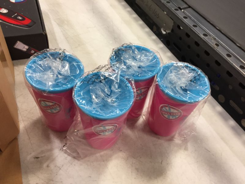 Photo 1 of  Wow Cup, Spill-Proof Cup (4 pack Pink with  Blue lids)