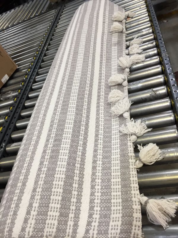 Photo 1 of 5ft by 7ft Pick Stitch Textured Stripe with Tassel Rug Jet Gray - Hearth & Hand™ with Magnolia