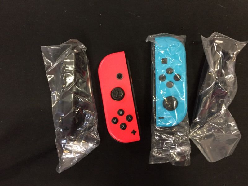 Photo 2 of Nintendo Joy-Con (L/R) - Neon Red/Neon Blue
