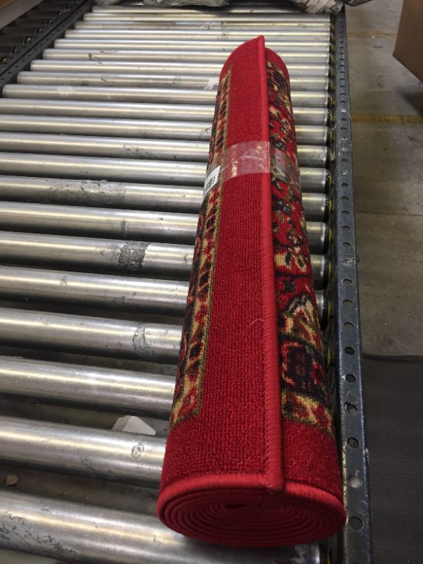 Photo 1 of 32" W X UNKNOWN LENGTH RED AREA RUG
