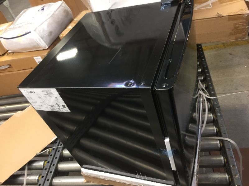 Photo 3 of Midea WHS-65LB1 Compact Single Reversible Door Refrigerator, 1.6 Cubic Feet(0.045 Cubic Meter), Black