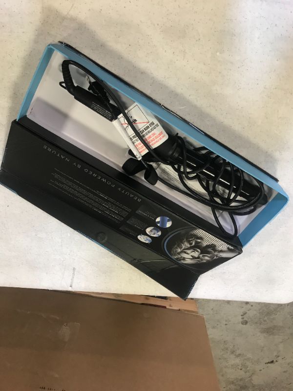 Photo 1 of Bio Ionic Long Barrel Styler Pro 1.25" Curling Iron