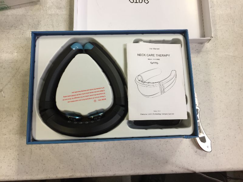 Photo 2 of osito neck care massager -used -open box 