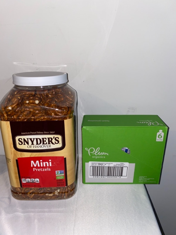 Photo 3 of 2PC LOT
Snyder's of Hanover Mini Pretzels, 40 oz Canister, EXP 08/09/2021

Plum Organics Mighty 4, Organic Toddler Food, Banana, Blueberry, Sweet Potato, Carrot, Greek Yogurt and Millet, 4 Ounce (Pack of 6), EXP 11/16/2021