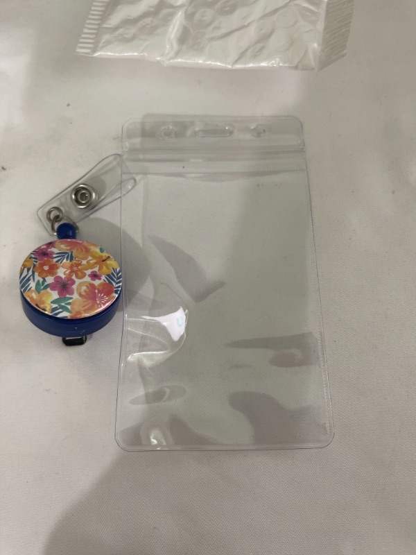 Photo 1 of CARD HOLDER WITH RETRACTABLE LEASH 