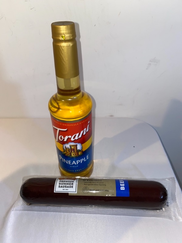 Photo 3 of 2PC LOT
Torani Pineapple Syrup 750mL, EXP 05/19/2023

Old Wisconsin Premium Summer Sausage, 100% Natural Meat, Charcuterie, Ready to Eat, High Protein, Low Carb, Keto, Gluten Free, Beef Flavor, 16 Ounce, EXP 03/28/2022