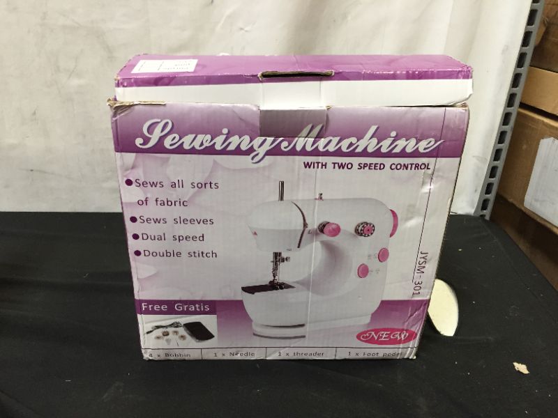 Photo 1 of Generic Purple and White Sewing Machine