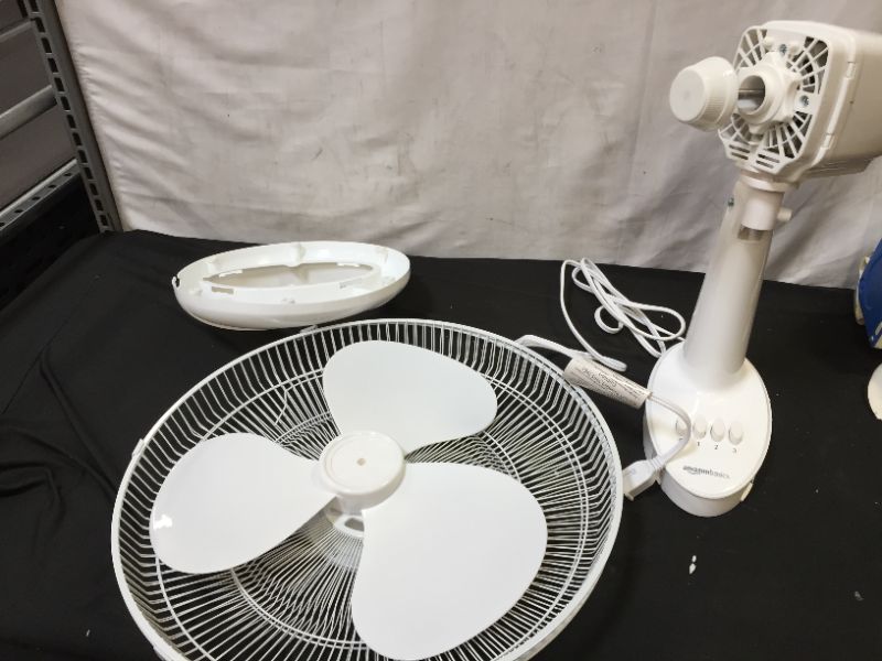 Photo 3 of Amazon Basics Oscillating Table Fan with 12-Inch Blades, 3 Speed Settings
