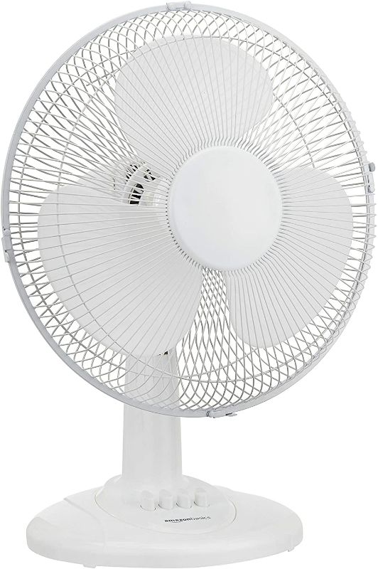 Photo 1 of Amazon Basics Oscillating Table Fan with 12-Inch Blades, 3 Speed Settings
