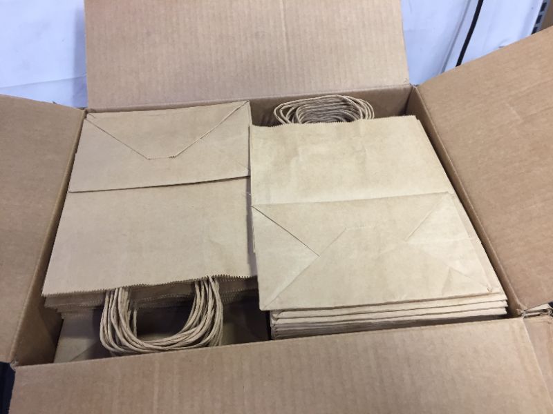 Photo 1 of Brown Kraft Paper Bulk Gift Bags with Handles (400 Count) - Perfect Solution for Party Favors