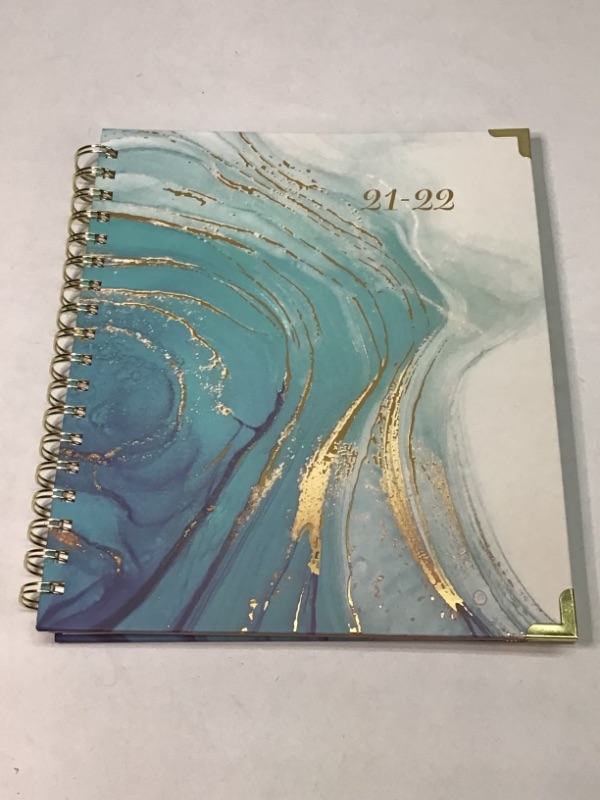 Photo 1 of 2 Planners -Weekly and Monthly Planners- Both are July 2021 thru June 2022