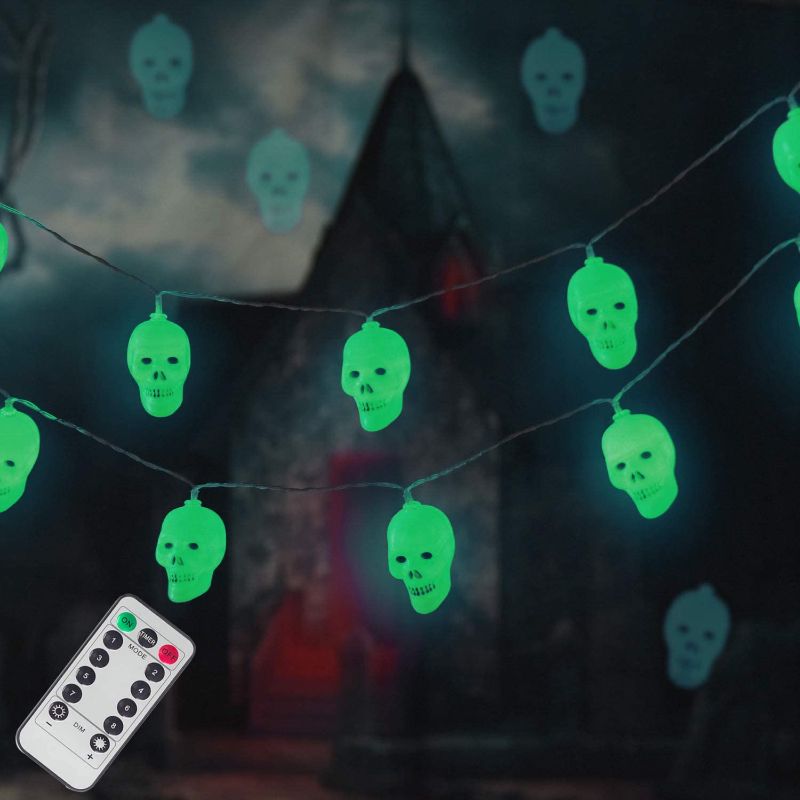 Photo 1 of LUMINATERY Halloween Skull Lantern String Lights, 30LED 8 Lighting Modes, Remote Control, Memory Function, Battery-Powered, Perfect for Indoor Outdoor Halloween Decoration (Green-1)