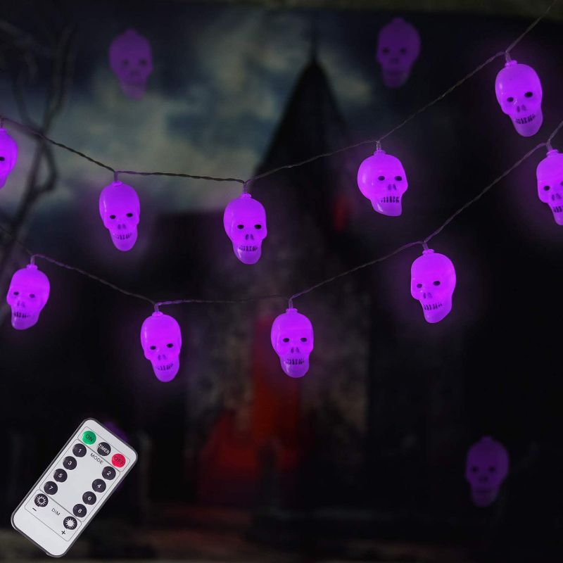 Photo 1 of LUMINATERY Halloween Skull Lantern String Lights, 30LED 16.4 ft 8 Lighting Modes, Remote Control, Memory Function, Battery-Powered, Perfect for Indoor Outdoor Halloween Decoration (Purple-1)