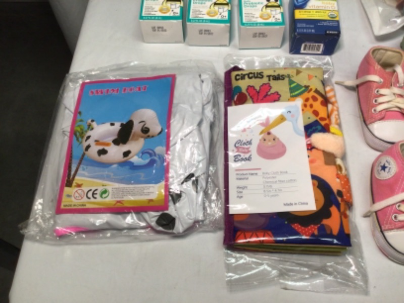 Photo 5 of Bundle of Assorted Items for Baby- 1) 3 Girls Tie Dye Clothing 2) Dr Browns Dishwasher Basket for Bottle Parts 3) Bathtub Toy 4) Seat Cover for Baby 5) Zarbees Daily Probiotic Drops  3 Boxes 5) Baby Vitamin D  6) Baby Swim Float 7) Protective Slipcover fo