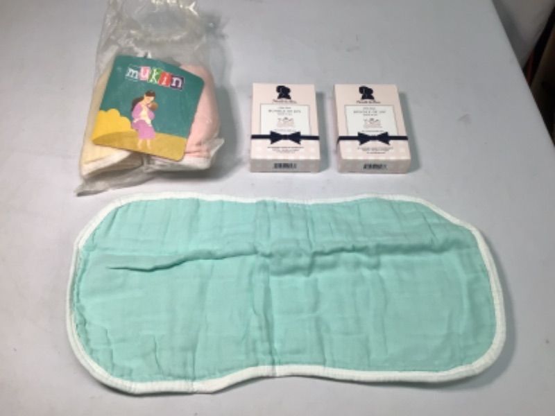 Photo 2 of Bundle of Assorted Items for Baby- 1) 3 Girls Tie Dye Clothing 2) Dr Browns Dishwasher Basket for Bottle Parts 3) Bathtub Toy 4) Seat Cover for Baby 5) Zarbees Daily Probiotic Drops  3 Boxes 5) Baby Vitamin D  6) Baby Swim Float 7) Protective Slipcover fo