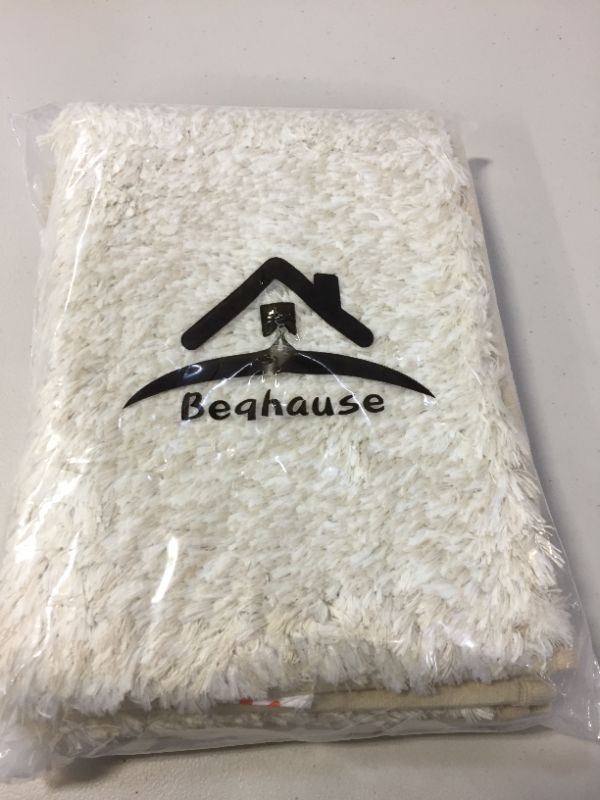 Photo 2 of BEQHAUSE BATH RUG 16" x 24" BEIGE