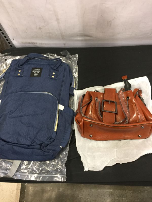 Photo 1 of backpack and purse bundle 