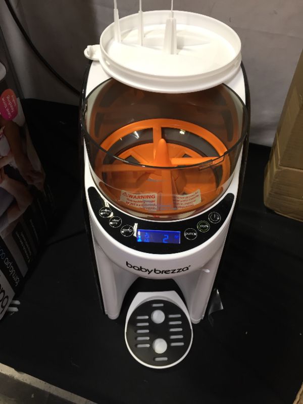 Photo 1 of Baby Brezza New and Improved Formula Pro Advanced Dispenser Machine, WHITE BOTTLE NOT INCLUDED 