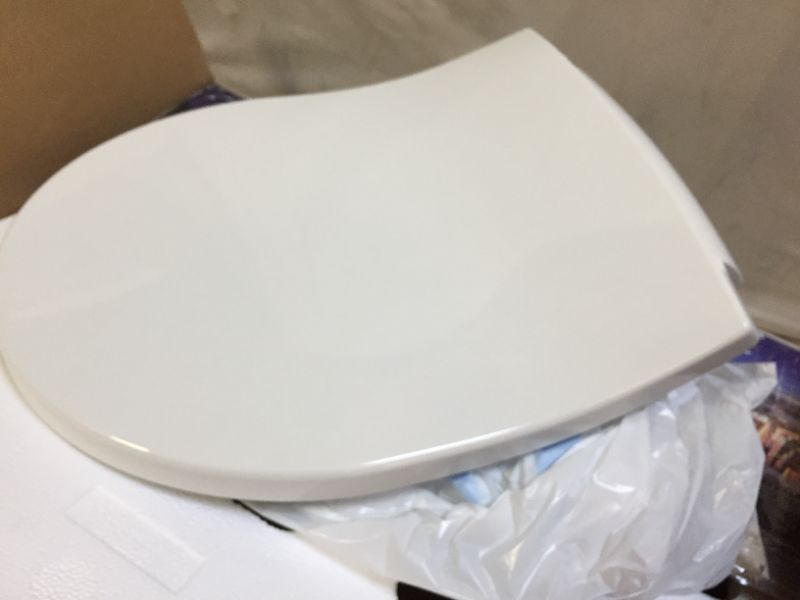 Photo 2 of Closed Front Toilet Seat in White