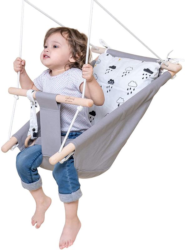 Photo 1 of Baby Swing for Infants and Toddler, Canvas Baby Hammock Swing Indoor and Outdoor with Safety Belt and Mounting Hardware, Wooden Hanging Swing Seat Chair for Baby up to 4 Year 