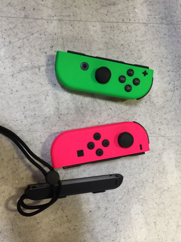 Photo 2 of Joy-Con (L/R) Wireless Controllers for Nintendo Switch// missing 1 slide 