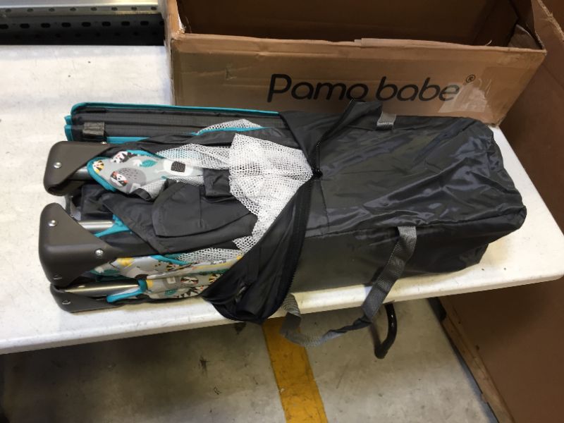 Photo 1 of Pamo Babe Deluxe Nursery Center ,Portable Playard with Comfortable Mattress,Changing Table and Toys