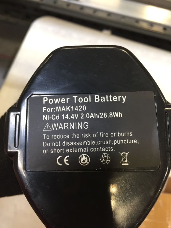 Photo 1 of tool battery color grey 