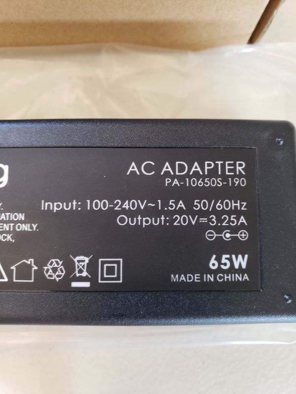 Photo 2 of OUTTAG 65W AC Adapter