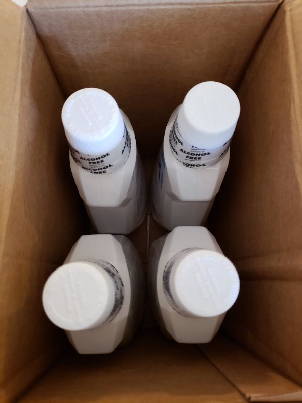 Photo 3 of Amazon Brand - Solimo Whitening Mouthwash. Case of 4 Bottles.