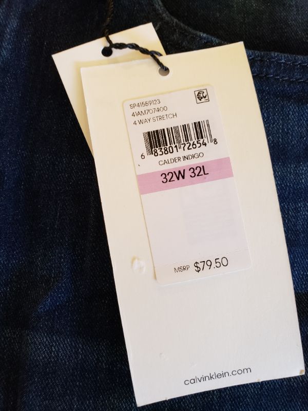 Photo 1 of CALVIN KLEIN JEANS Athletic Taper Blue Jean, Size 32x32.