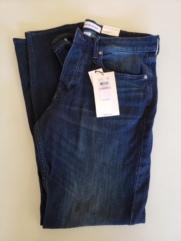 Photo 1 of CALVIN KLEIN JEANS Athletic Taper Blue Jean, Size 32x32.