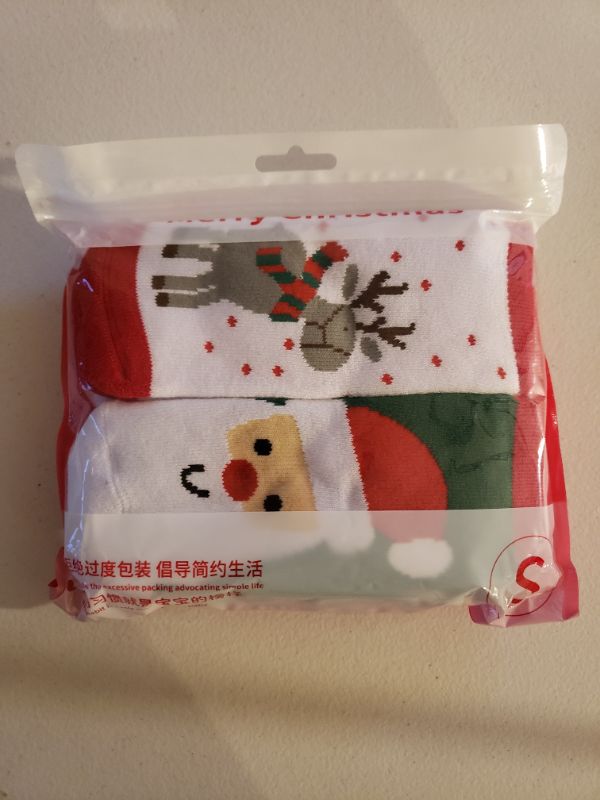 Photo 1 of Christmas Socks, Size Small. Sealed Package Brand New.