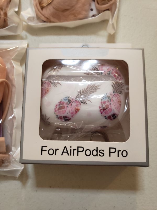 Photo 2 of Air Pods cases, lot of 4.